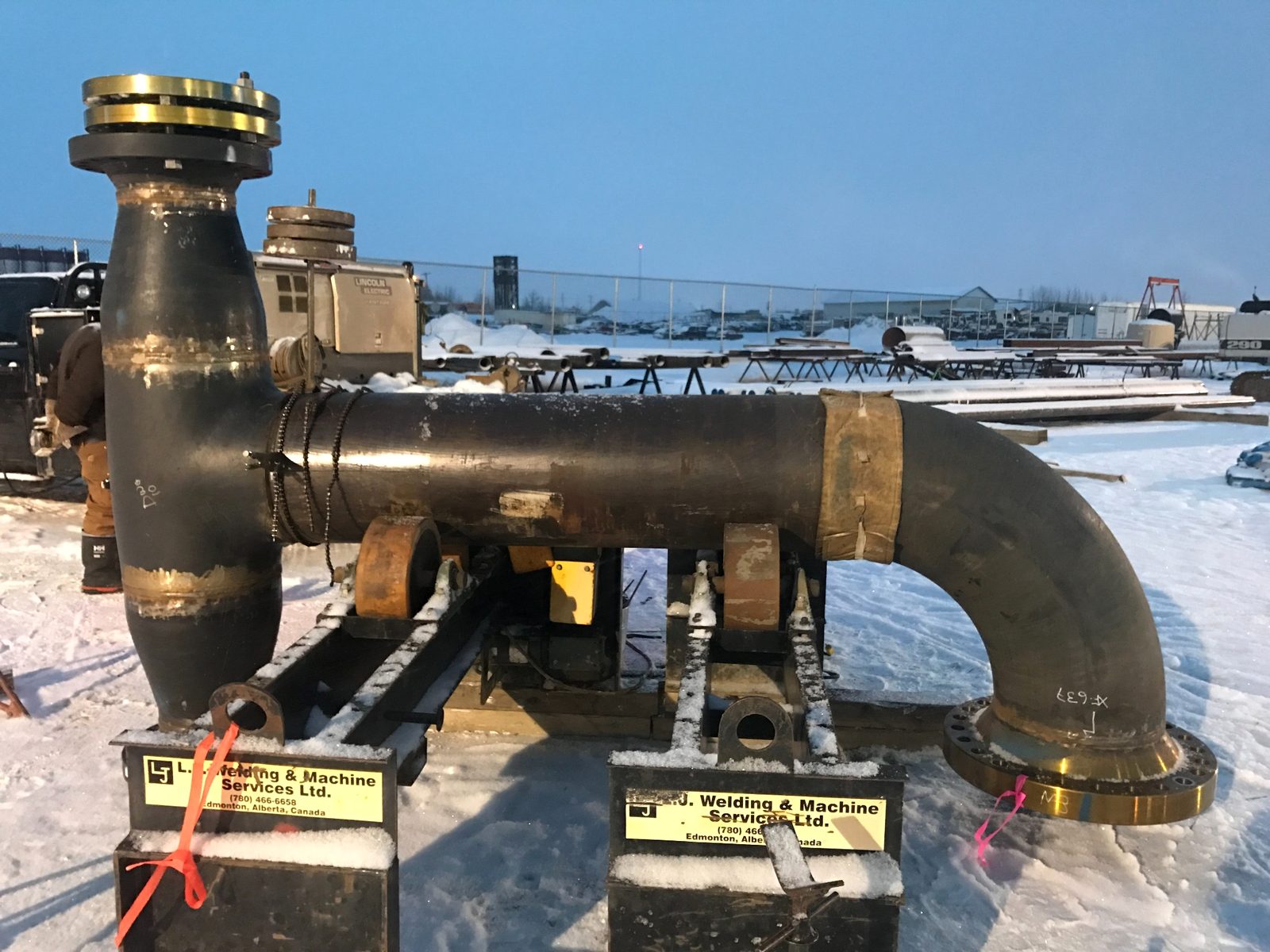 Pipe assembly with reducer and elbow